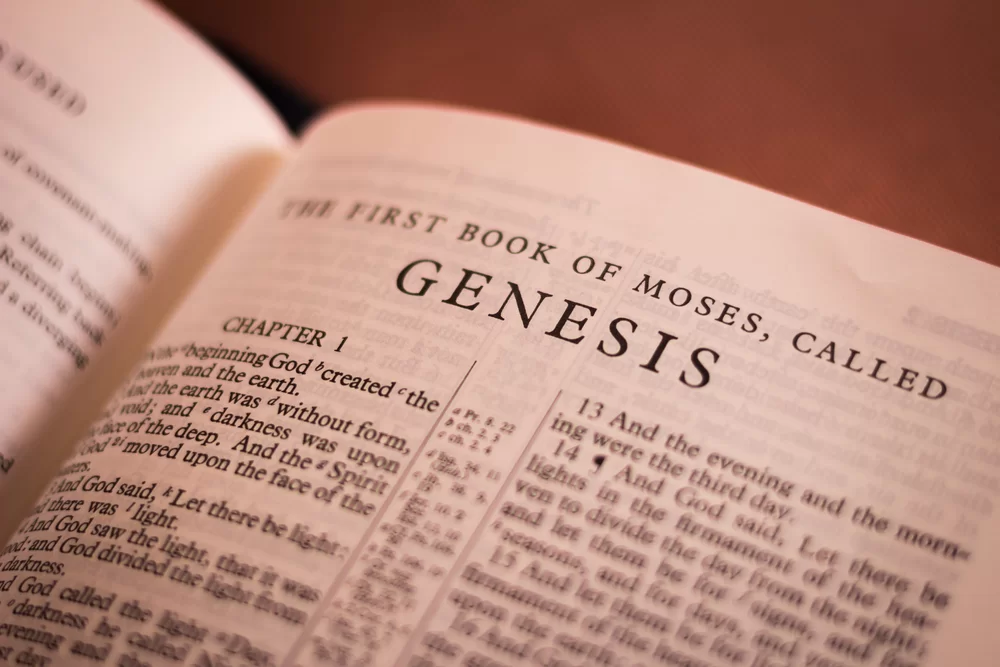 Bible open to the book of Genesis