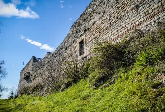 Old stone castle at the top of a hill