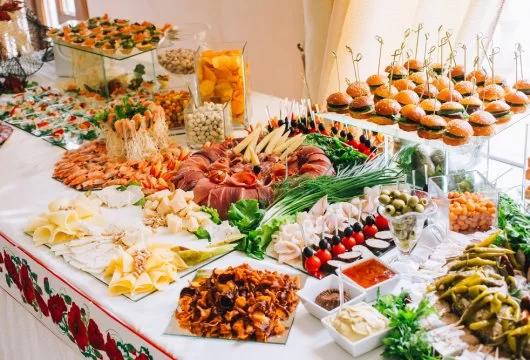 Buffet table full of party foods