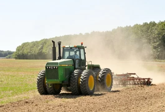 Tractor driving through a field