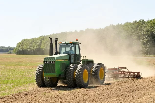 Tractor driving through a field