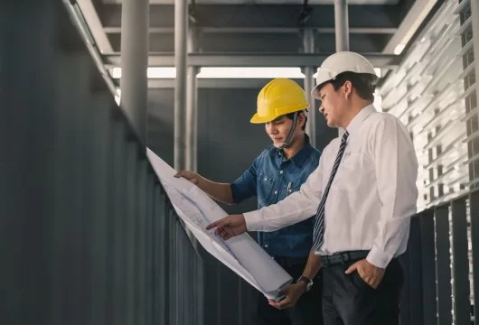 Two engineers having a conversation
