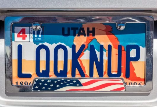 Inspirational license plate that means "looking up"