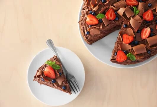 Chocolate cake topped with berries