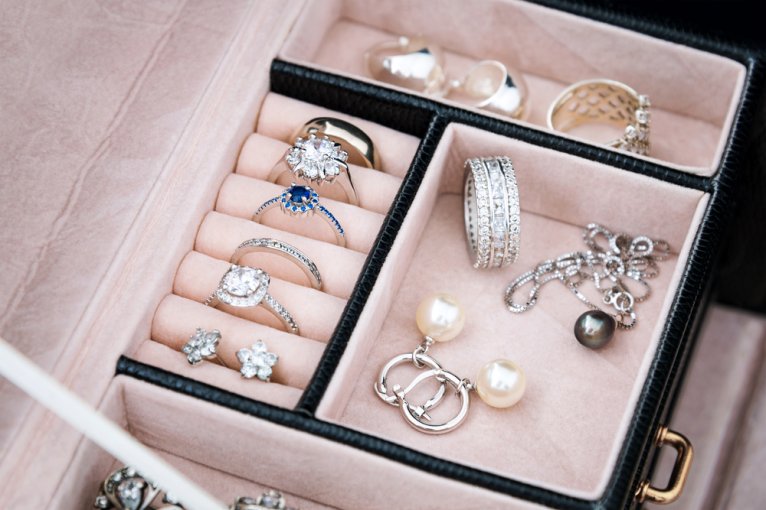 Close-up of jewelry box full of jewelry