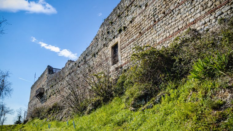 Old stone castle at the top of a hill