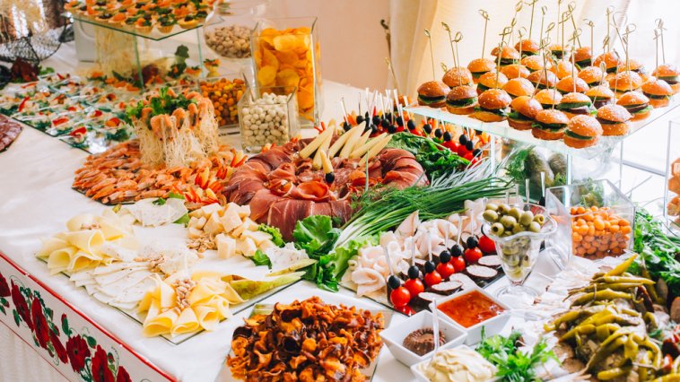 Buffet table full of party foods