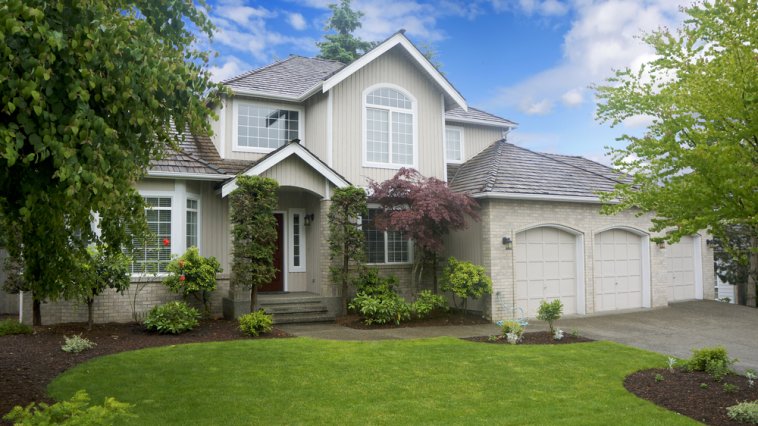 Exterior of a large home on a sunny day