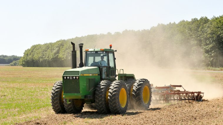 Tractor driving through a field