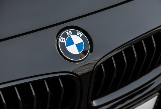 BMW logo above the grill of a BMW car