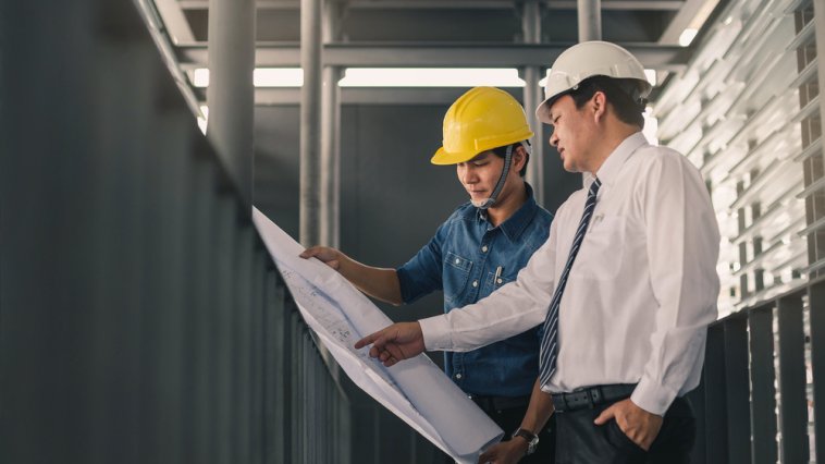 Two engineers having a conversation