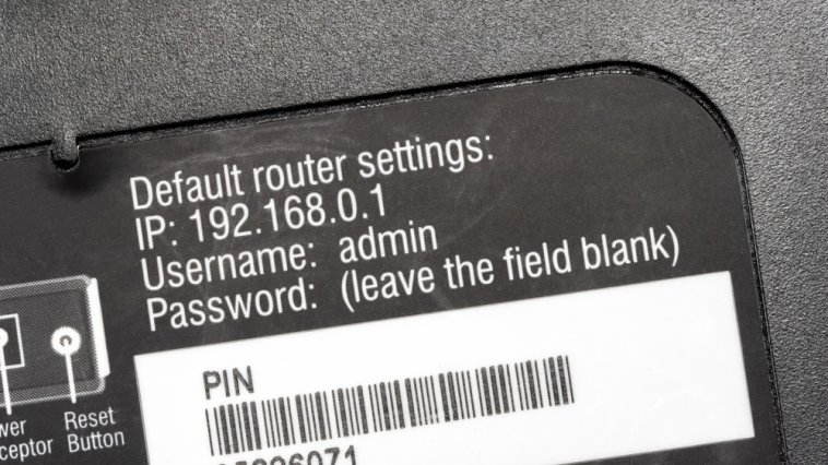 IP address, username, and password shown on a router sticker