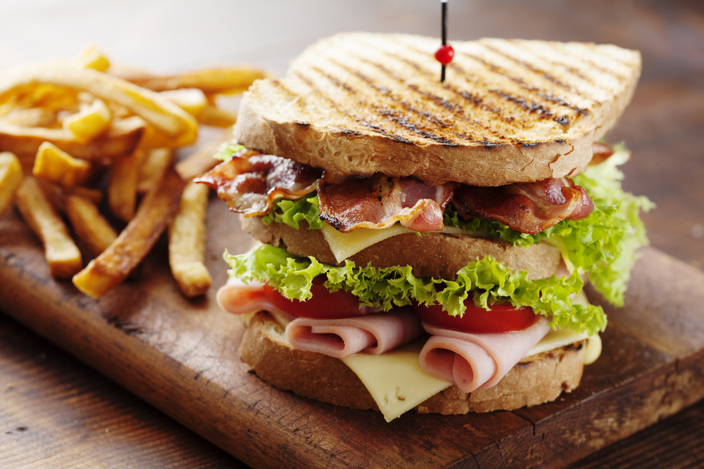 Club sandwich served with fries