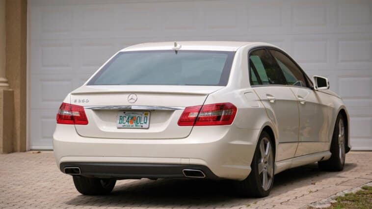 White car parked in a home's driveway