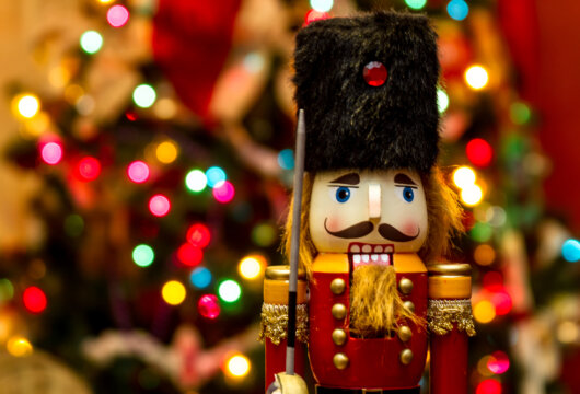 Soldier nutcracker pictured in front of Christmas lights